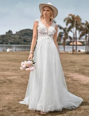 Robe de mariée longue ligne A en tulle perlé ivoire scintillant